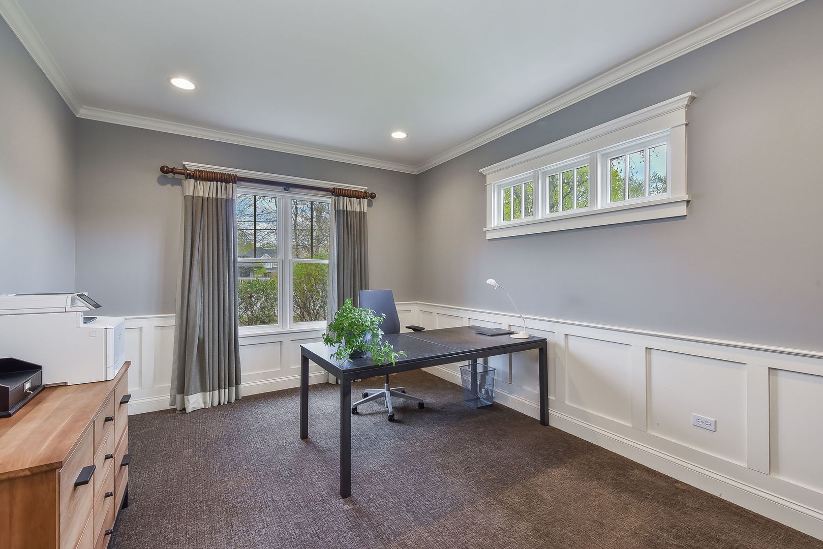 427 Ranch Road Wheaton, IL 60187 - Photo 16 of 38 a view of a workspace with furniture and a window