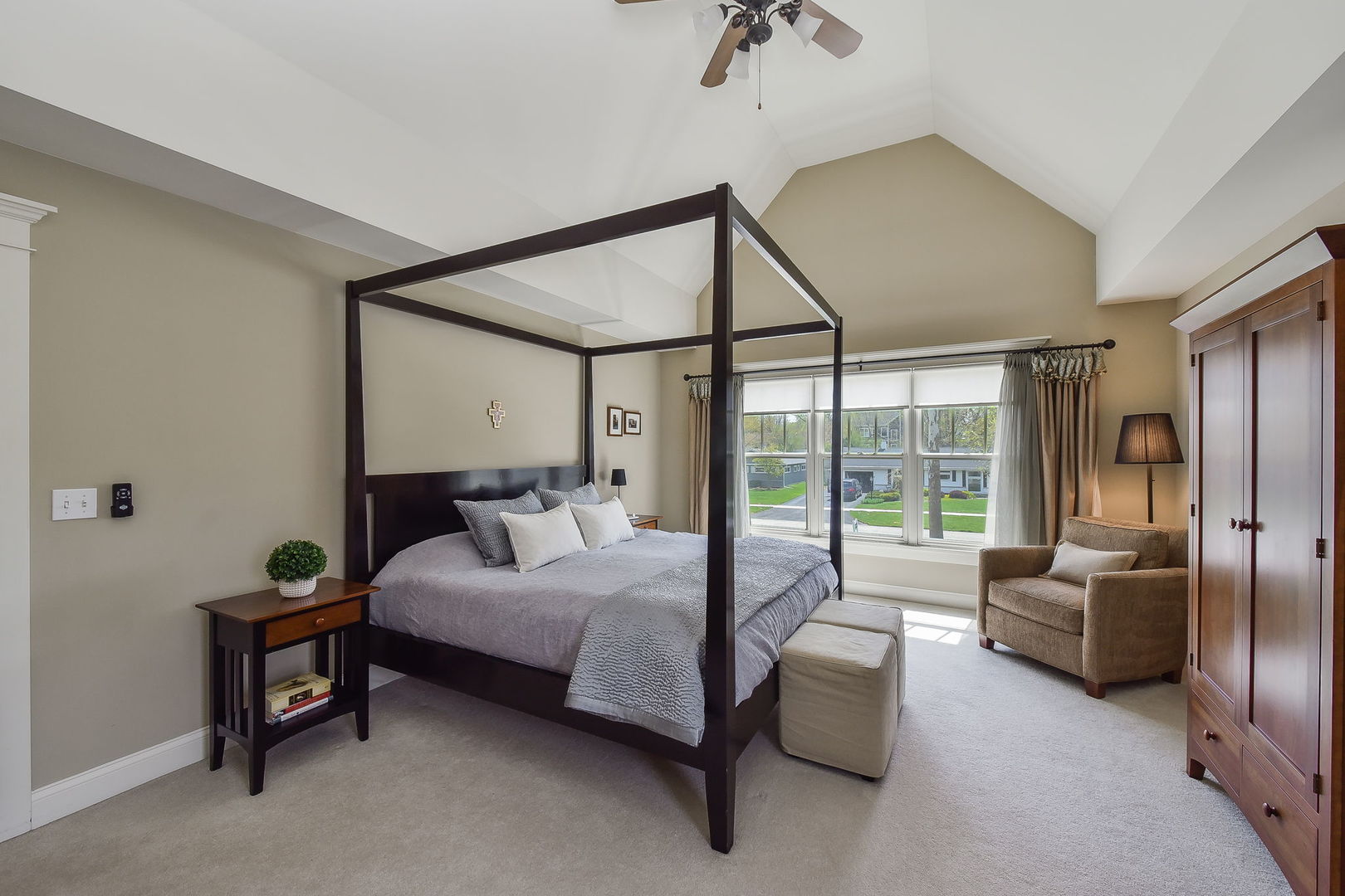427 Ranch Road Wheaton, IL 60187 - Photo 18 of 38 a bedroom with a bed couch and a large window