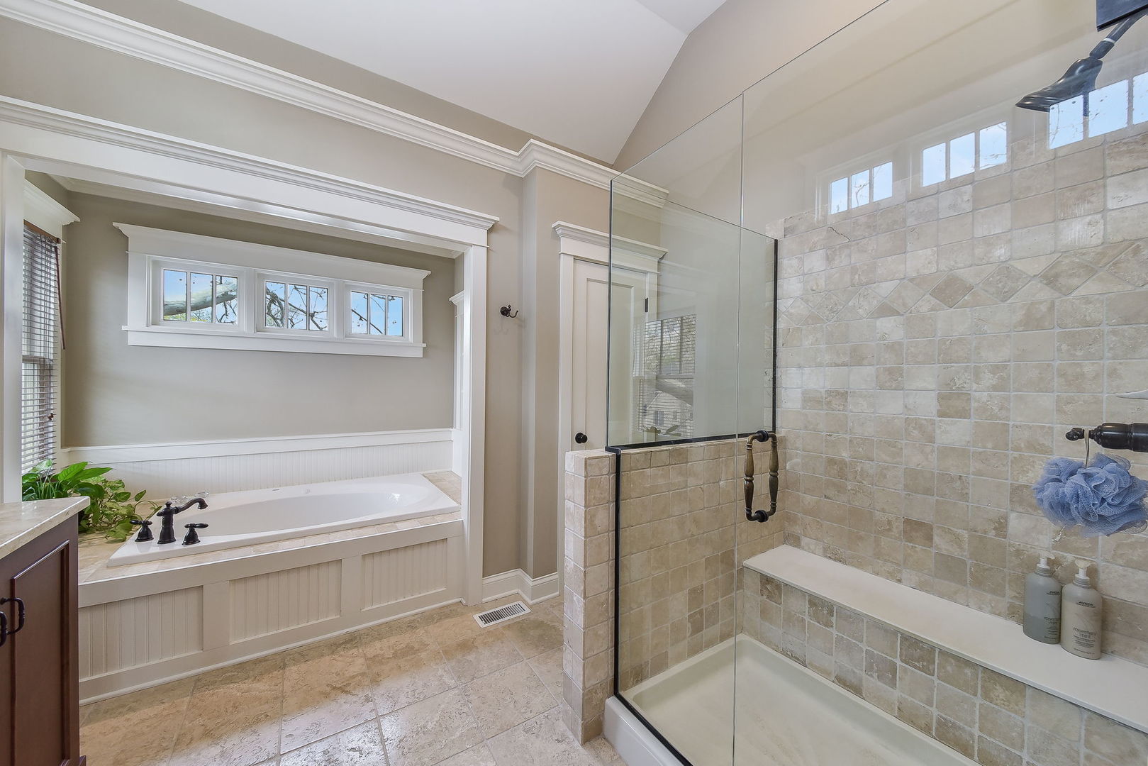 427 Ranch Road Wheaton, IL 60187 - Photo 20 of 38 a bathroom with a bathtub and a shower