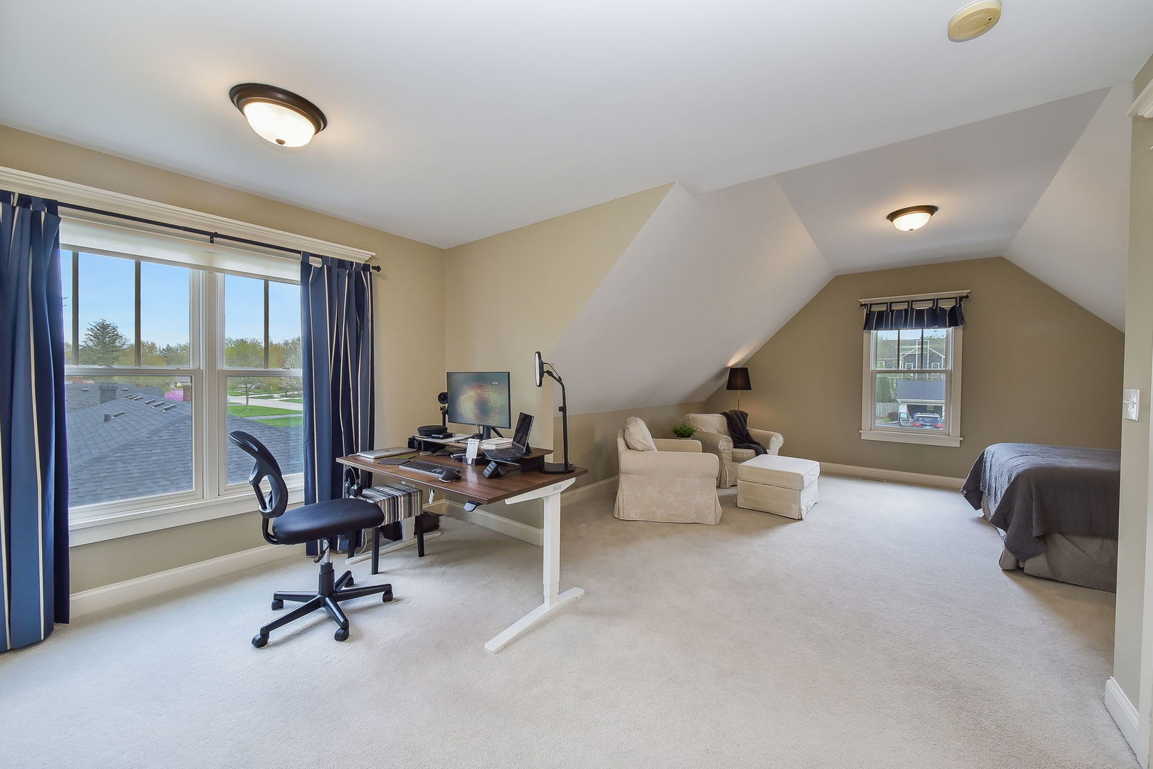 427 Ranch Road Wheaton, IL 60187 - Photo 21 of 38 a view of a livingroom with workspace and a couch