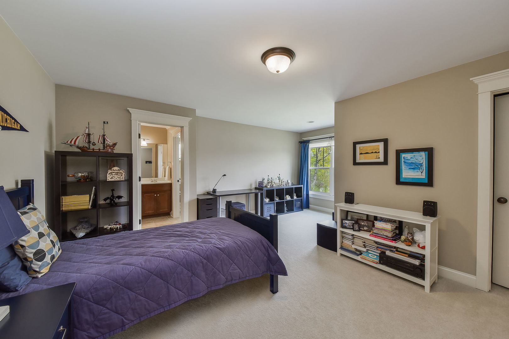 427 Ranch Road Wheaton, IL 60187 - Photo 25 of 38 a spacious bedroom with a bed and a view of kitchen