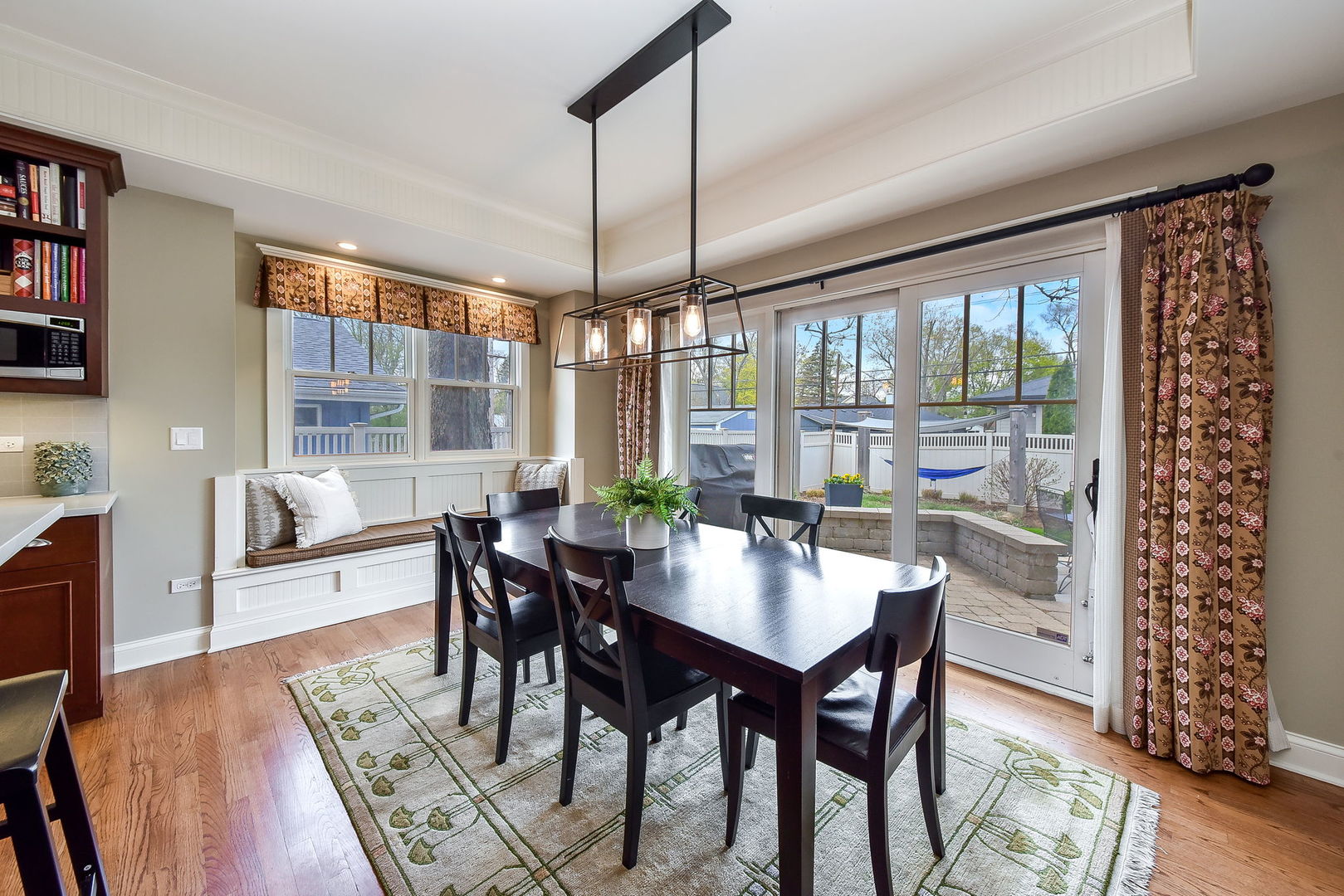 427 Ranch Road Wheaton, IL 60187 - Photo 9 of 38 a dining room with furniture window wooden floor