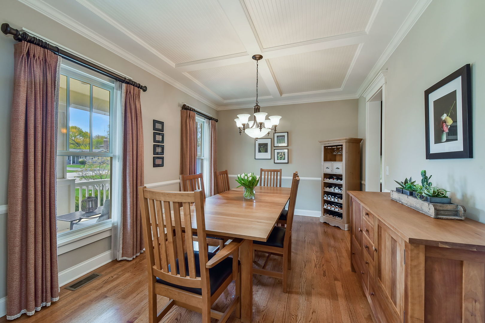 427 Ranch Road Wheaton, IL 60187 - Photo 10 of 38 a view of a dining room with furniture window and wooden floor