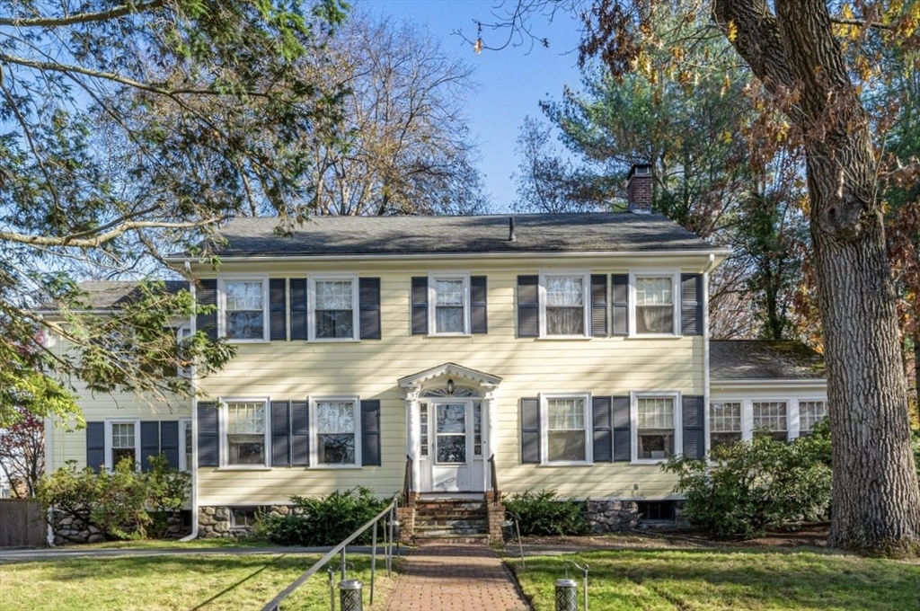 front view of a building with a yard