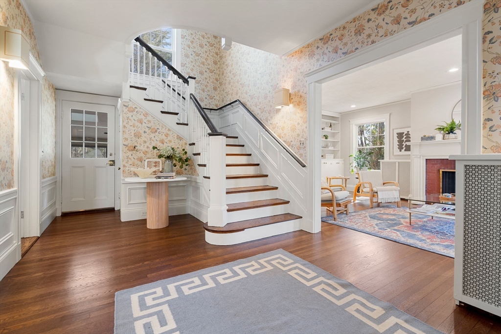 1066 Walnut Street Newton, MA 02461 - Photo 2 of 37 a view of entryway and hall with wooden floor