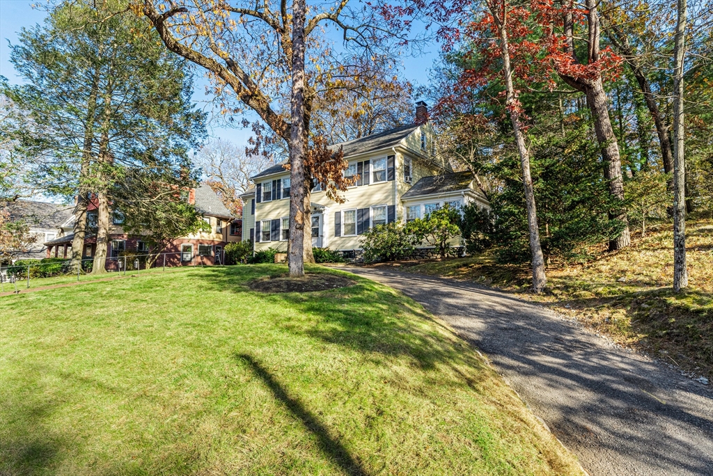 1066 Walnut Street Newton, MA 02461 - Photo 30 of 37 a view of road with large trees