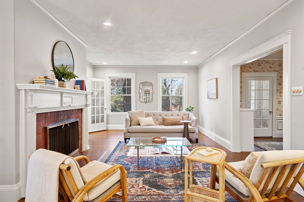 1066 Walnut Street Newton, MA 02461 - Photo 5 of 37 a living room with furniture and a fireplace