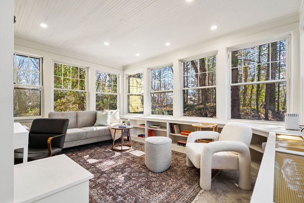 1066 Walnut Street Newton, MA 02461 - Photo 9 of 37 a living room with furniture and floor to ceiling windows