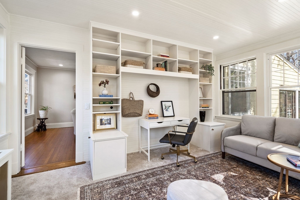 1066 Walnut Street Newton, MA 02461 - Photo 10 of 37 a living room with furniture and a large window