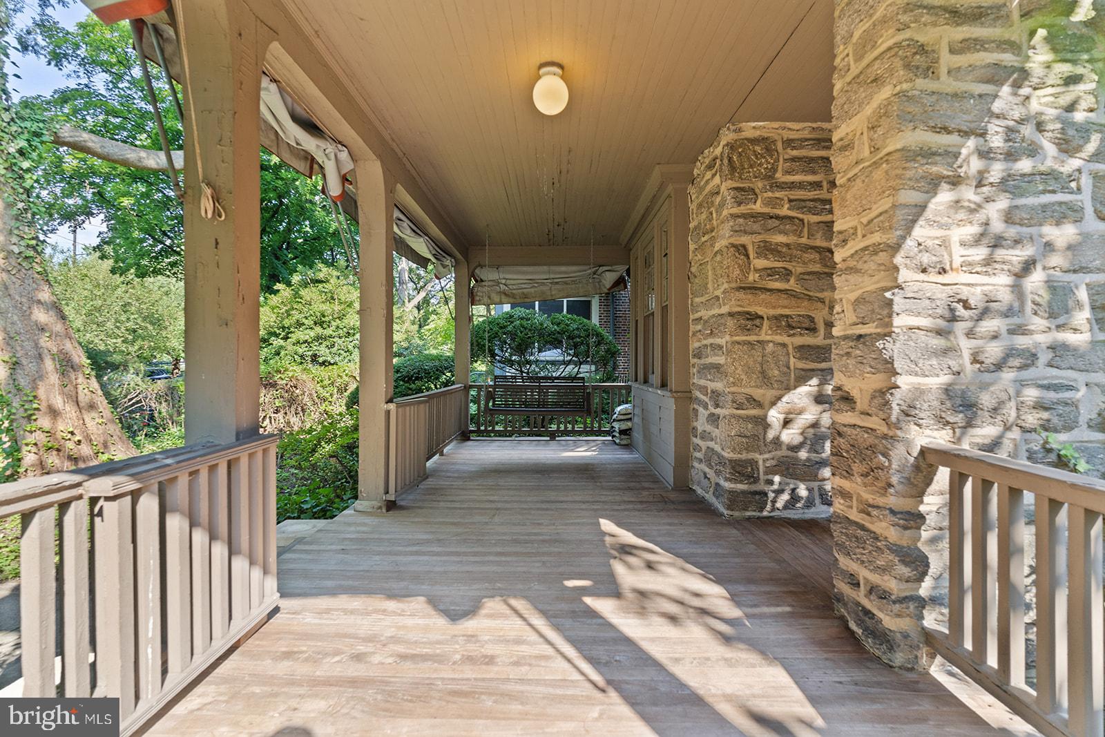 7209 Cresheim Road Philadelphia, PA 19119 - Photo 3 of 71 Front porch - swing view