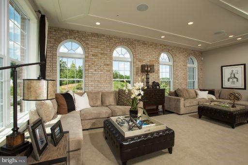 7682 Elmcrest Road Hanover, MD 21076 - Photo 3 of 21 a living room with furniture and a large window