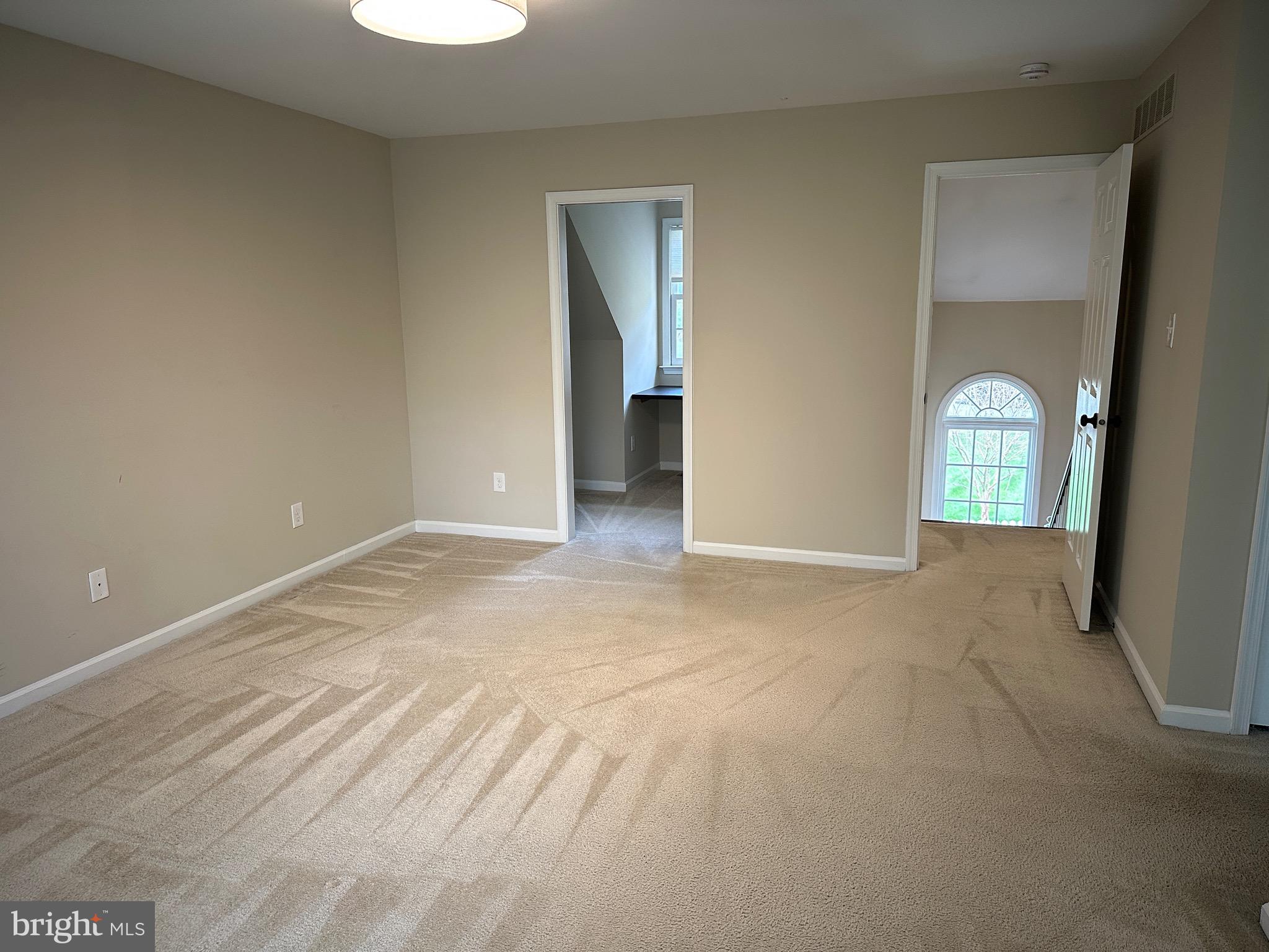 418 Waynesbrooke Road Berwyn, PA 19312 - Photo 17 of 30 an empty room with windows and entrance