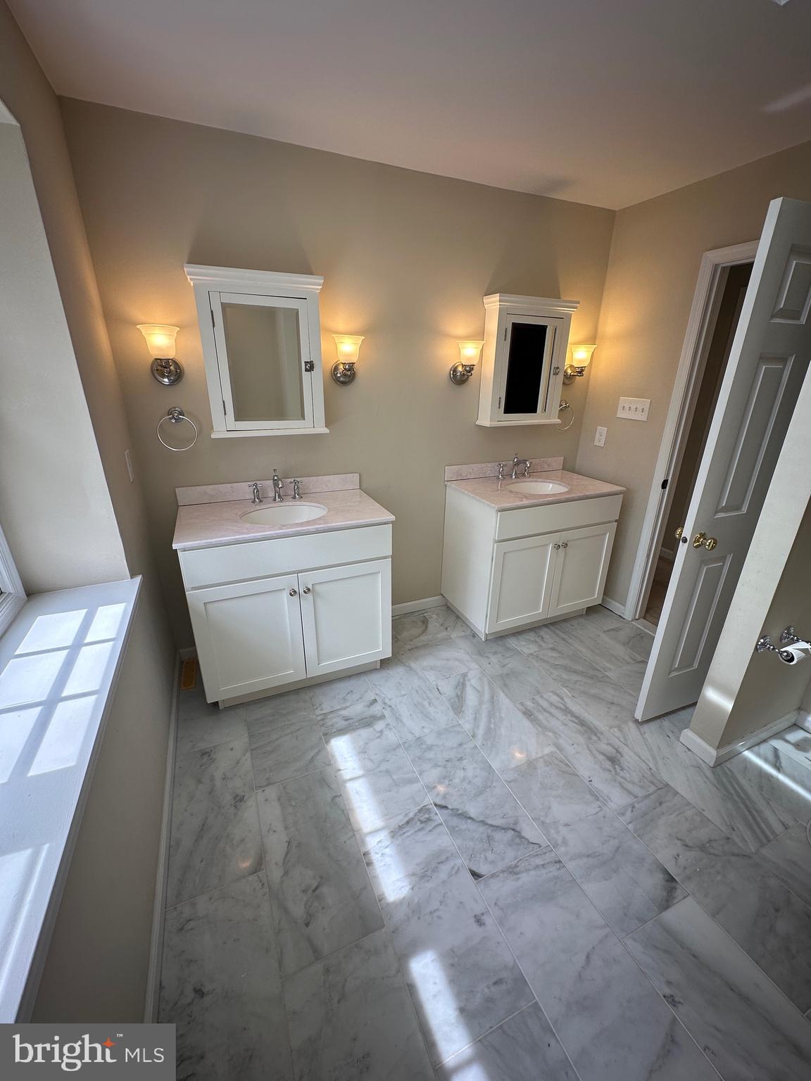 418 Waynesbrooke Road Berwyn, PA 19312 - Photo 18 of 30 a room with a bed and a flat screen tv