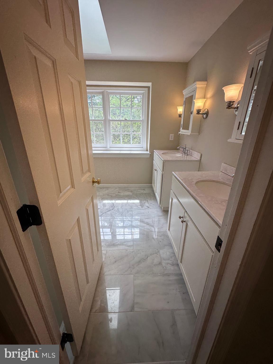 418 Waynesbrooke Road Berwyn, PA 19312 - Photo 19 of 30 a bathroom with sink and mirror
