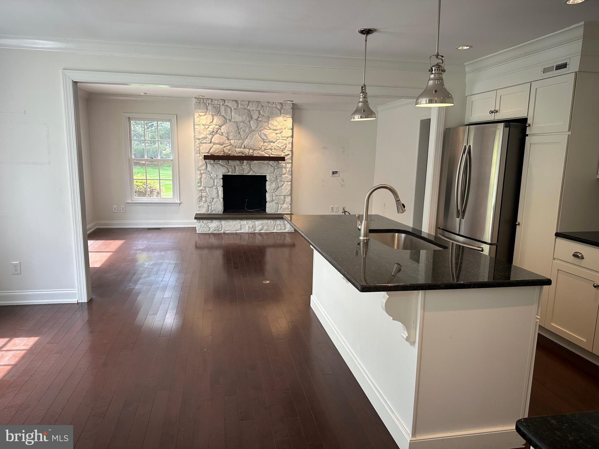 418 Waynesbrooke Road Berwyn, PA 19312 - Photo 7 of 30 a kitchen with granite countertop a refrigerator and a sink