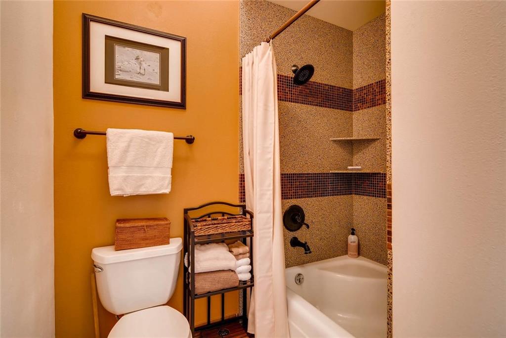 650 Tennis Club Road, Unit 1340 Keystone, CO 80435 - Photo 12 of 25 a bathroom with a toilet sink and tub