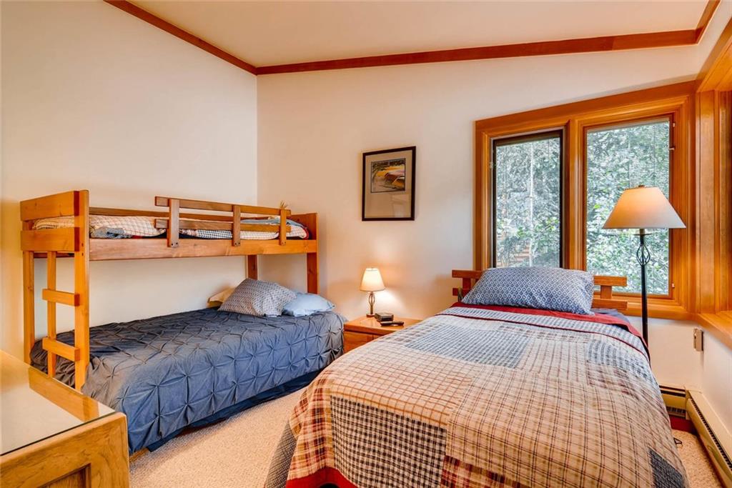 650 Tennis Club Road, Unit 1340 Keystone, CO 80435 - Photo 15 of 25 a bedroom with a bed and window