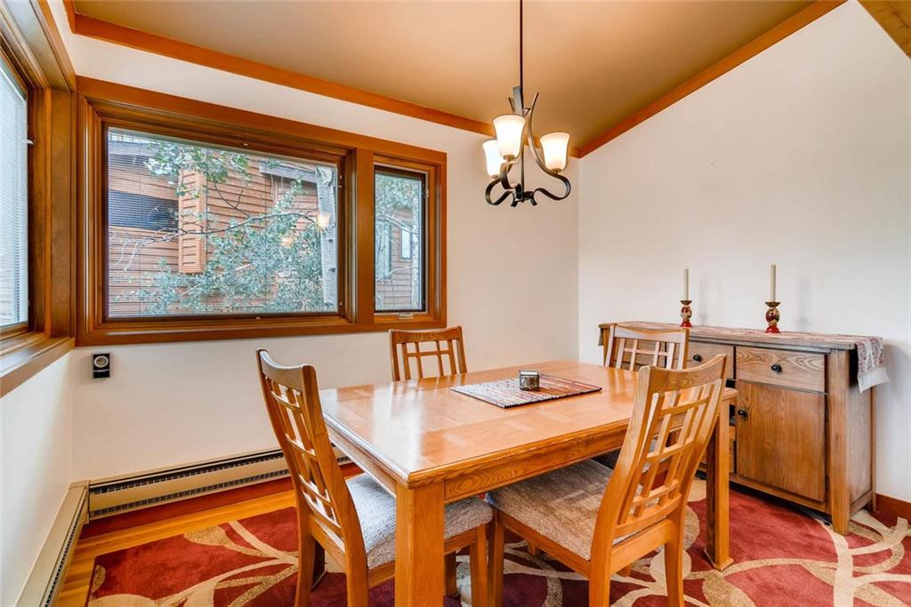 650 Tennis Club Road, Unit 1340 Keystone, CO 80435 - Photo 17 of 25 a view of a dining room with furniture window and outside view