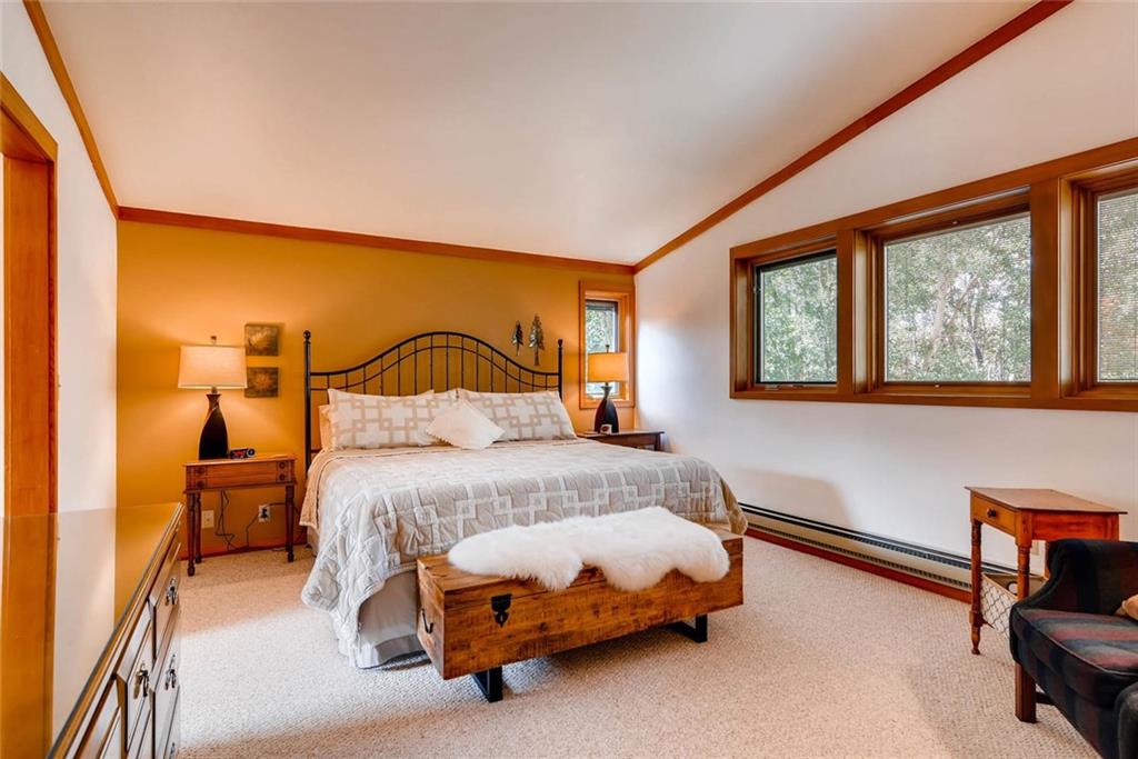 650 Tennis Club Road, Unit 1340 Keystone, CO 80435 - Photo 7 of 25 a bedroom with a bed chair and a window