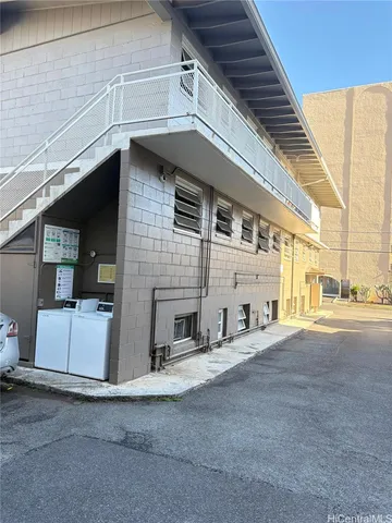 a view of a house with a street