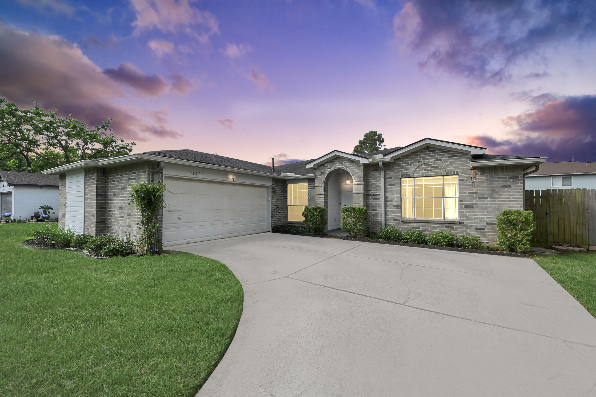 28707 Stapleford Street Spring, TX 77386 - Photo 1 of 38 a front view of a house with a yard and garage
