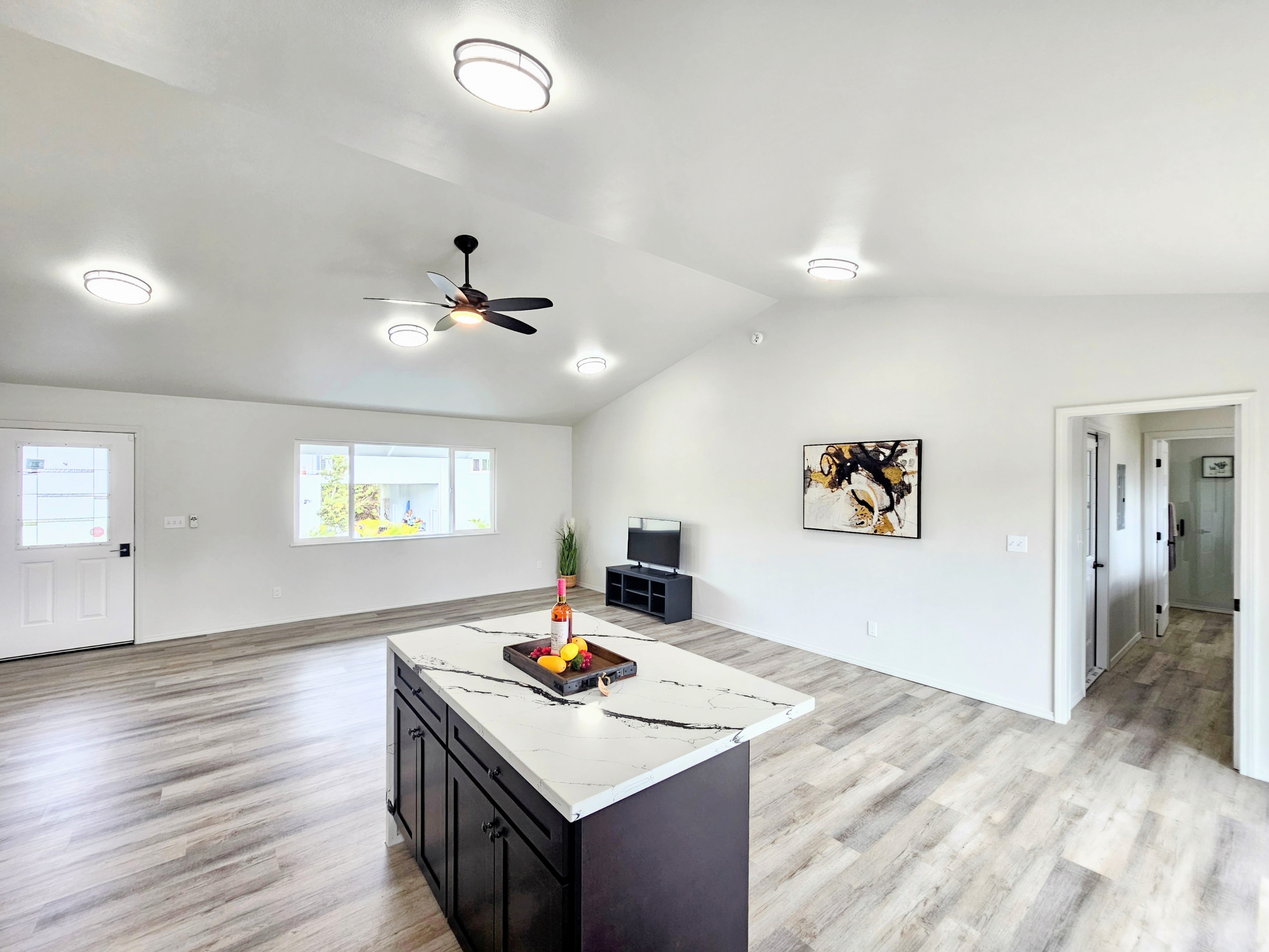 11-3385 Old Volcano Road Volcano, HI 96785 - Photo 13 of 30 a view of a workspace with furniture and wooden floor