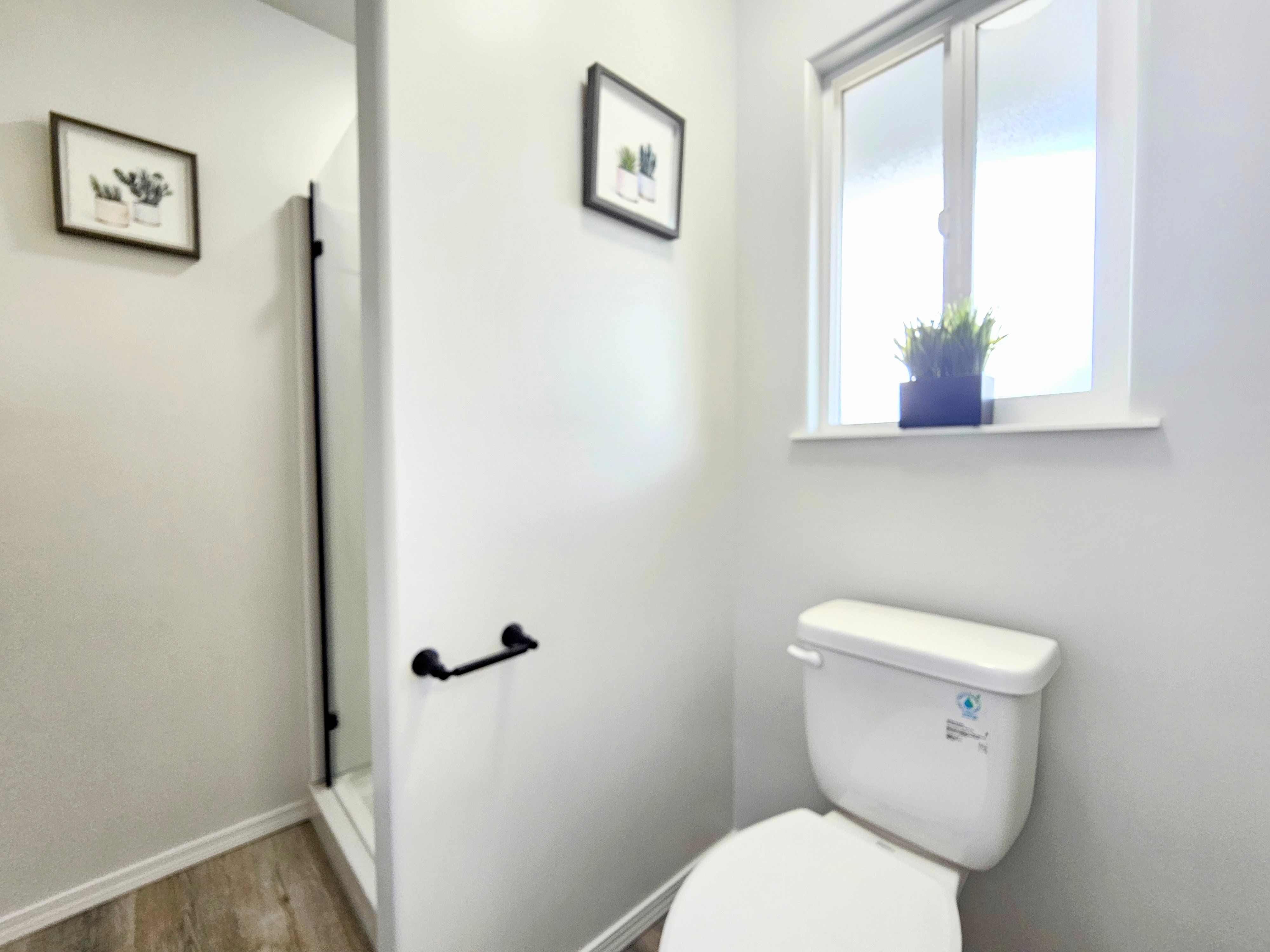 11-3385 Old Volcano Road Volcano, HI 96785 - Photo 20 of 30 a white toilet sitting next to a bathroom sink