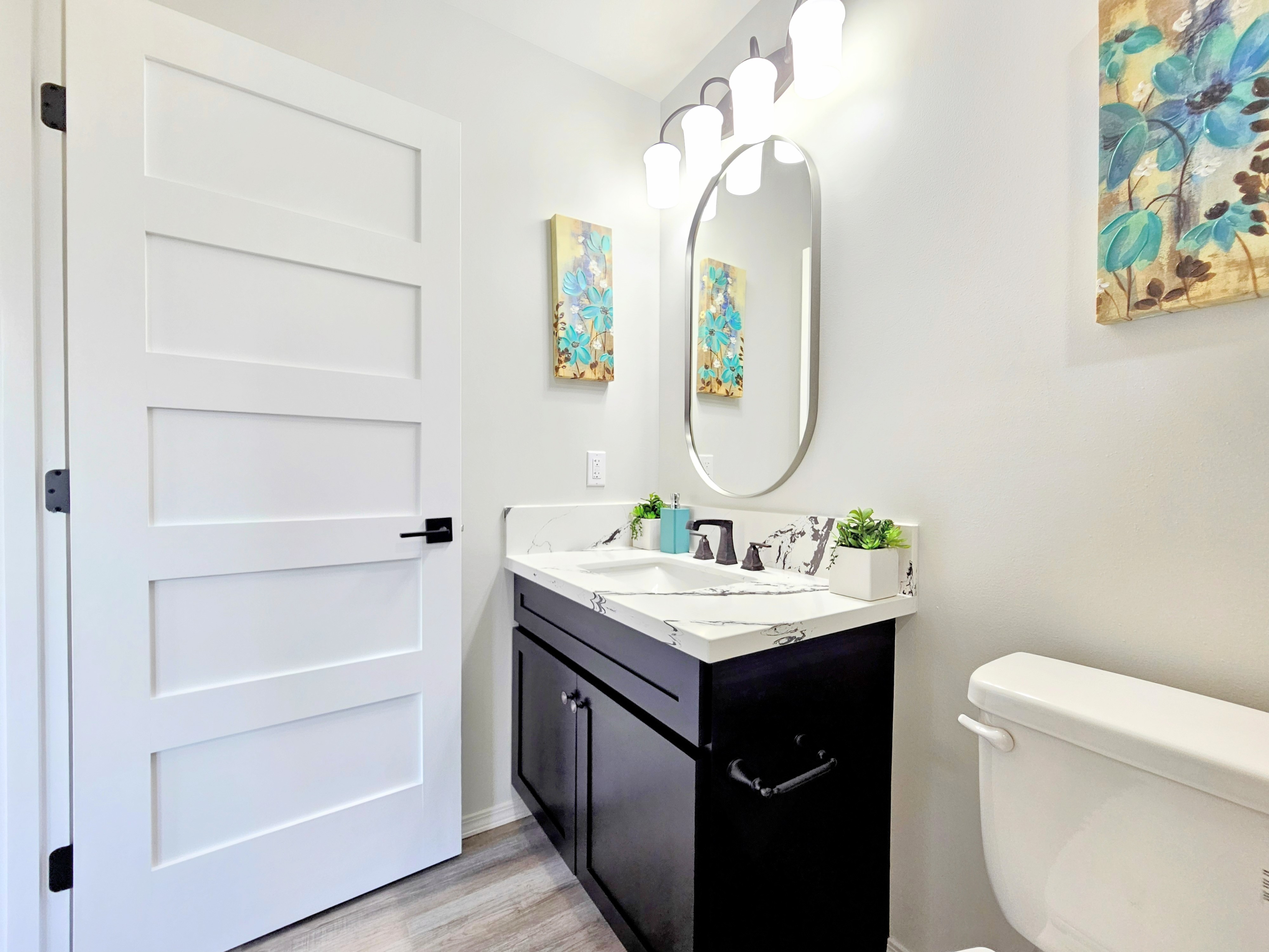 11-3385 Old Volcano Road Volcano, HI 96785 - Photo 23 of 30 a bathroom with a sink a toilet and a mirror