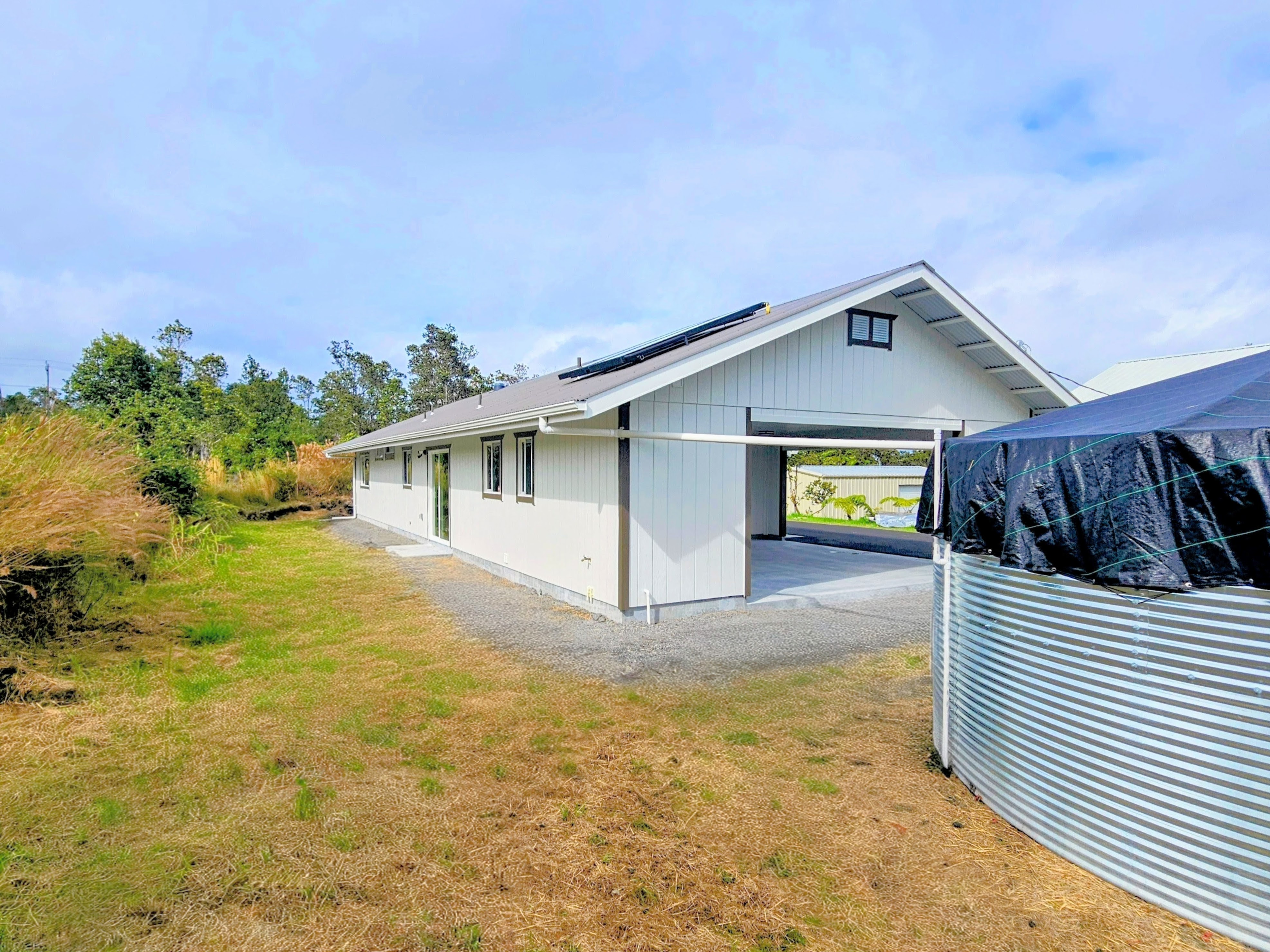 11-3385 Old Volcano Road Volcano, HI 96785 - Photo 28 of 30 a view of a house with a patio