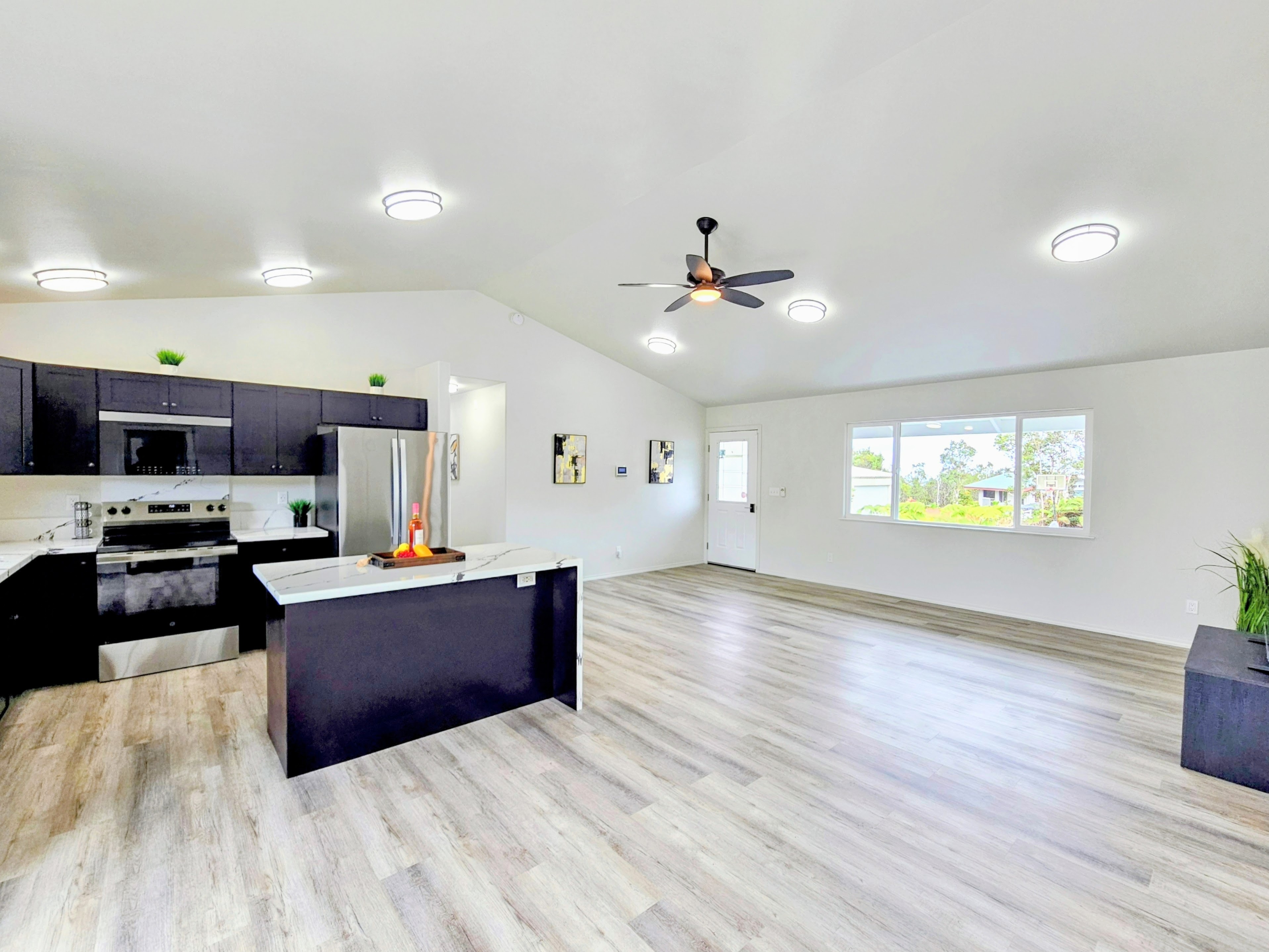 11-3385 Old Volcano Road Volcano, HI 96785 - Photo 9 of 30 a view of kitchen with microwave and stove