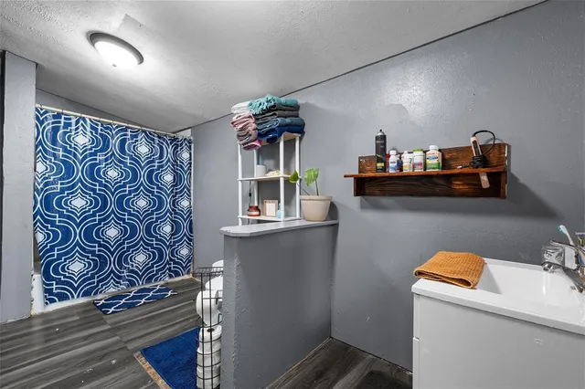 a view of storage and utility room with washer and dryer