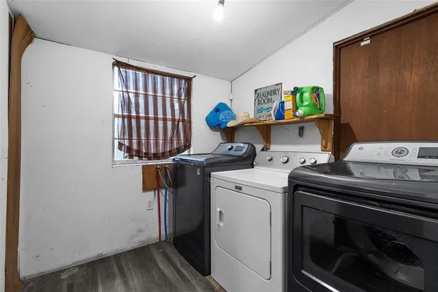 a utility room with dryer and washer