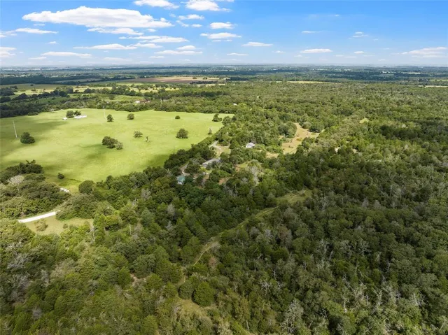 a view of a city with an ocean