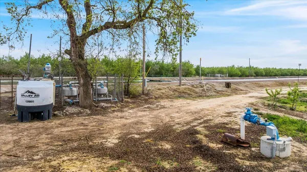 a view of a backyard with sitting area