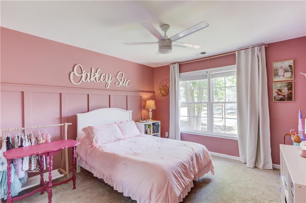 2310 Olde Hickory Place Monroe, GA 30656 - Photo 24 of 46 a bedroom with a bed and a window