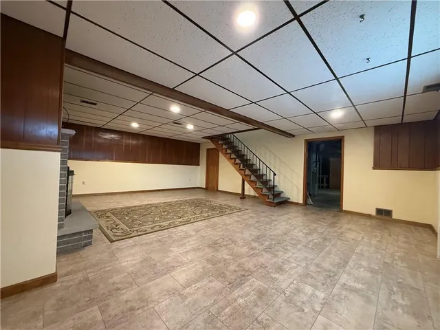 a bathroom with a toilet sink and shower