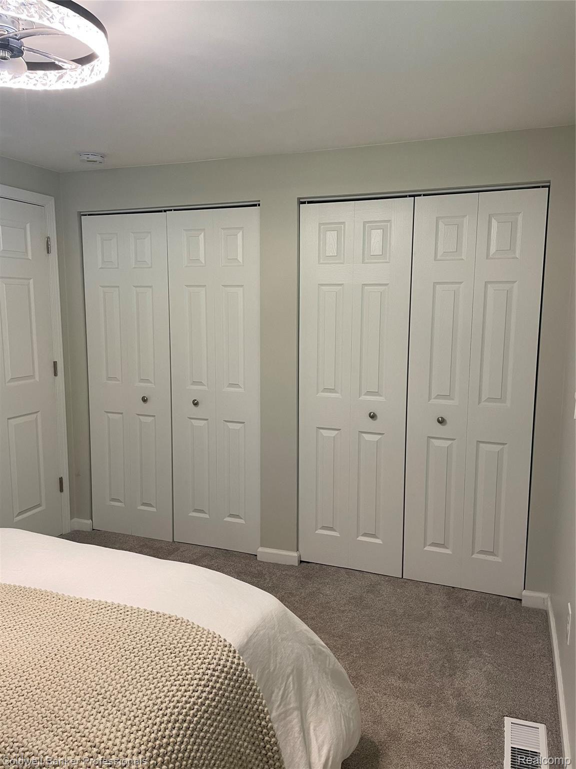 140 South Conklin Road Lake Orion, MI 48362 - Photo 13 of 18 His and Her Closet.jpg