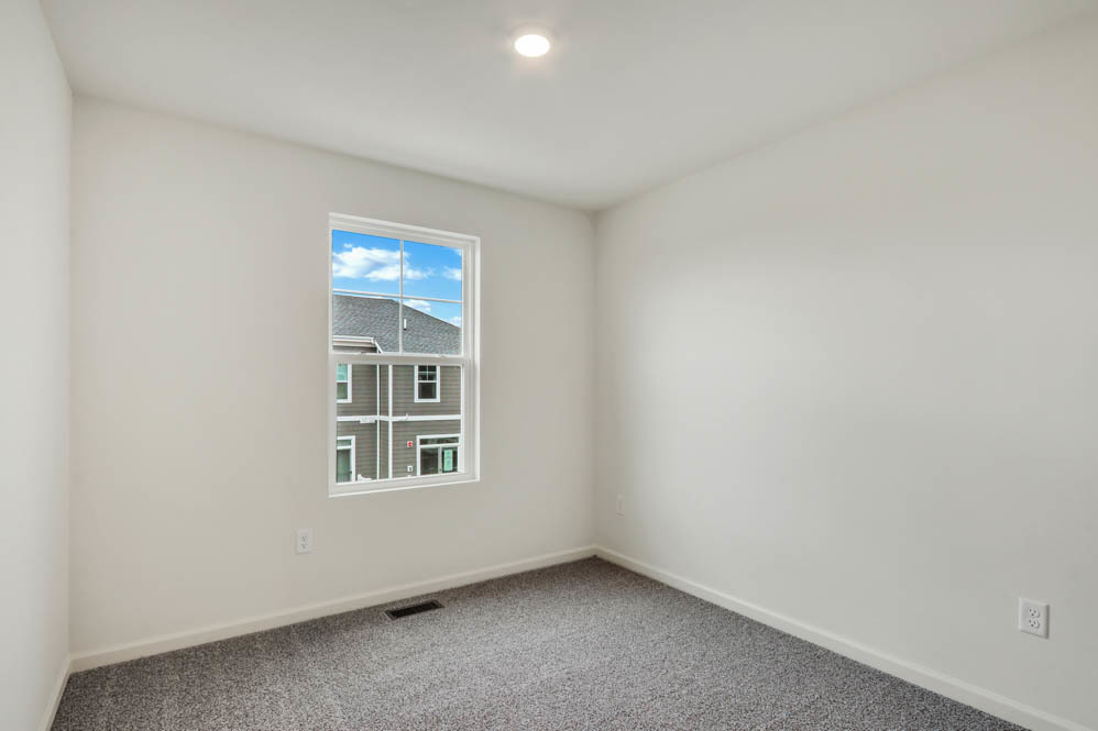 577 Yosemite Way Mundelein, IL 60060 - Photo 16 of 42 a view of an empty room with a window