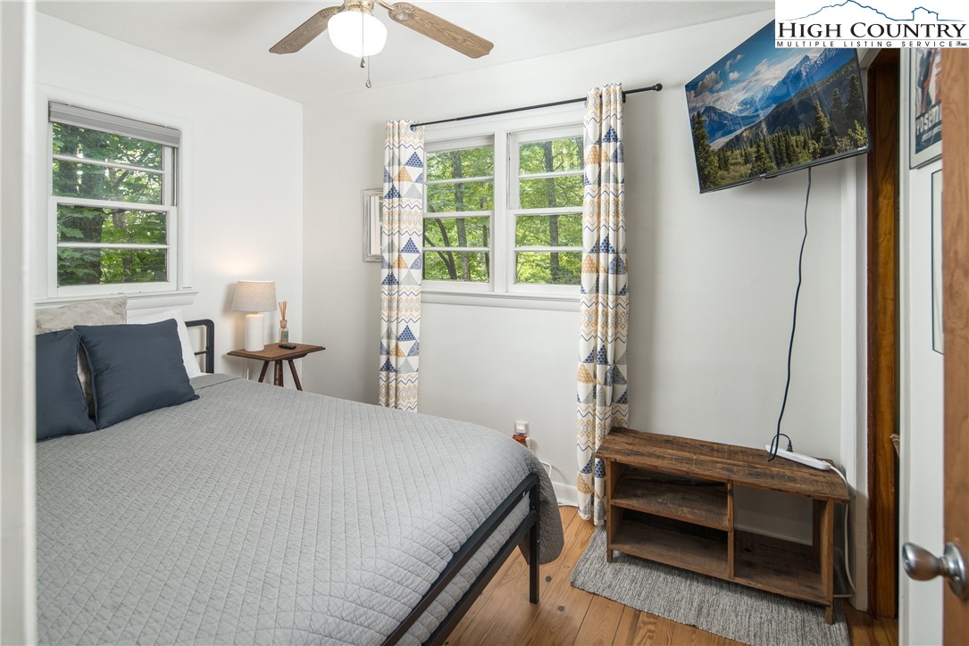 190 Bradley Court Boone, NC 28607 - Photo 14 of 28 a bedroom with a bed and a window
