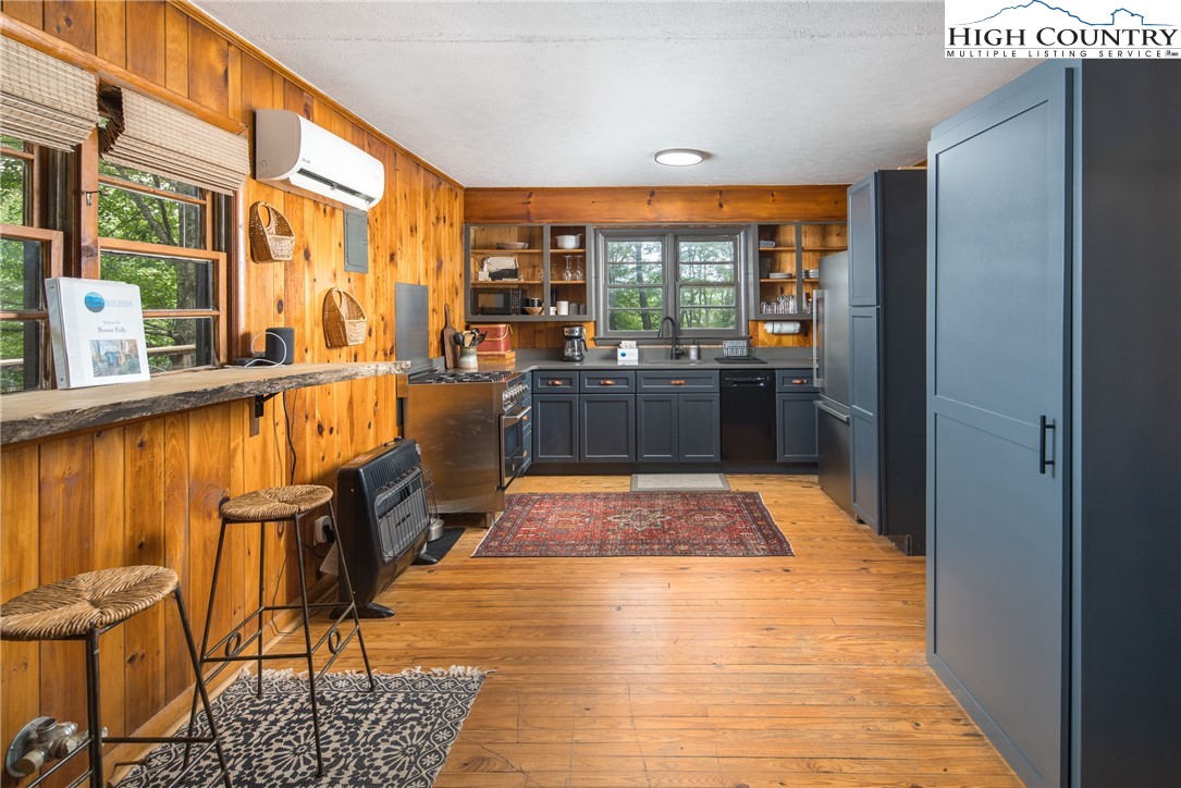 190 Bradley Court Boone, NC 28607 - Photo 2 of 28 a room with lots of furniture and wooden floor