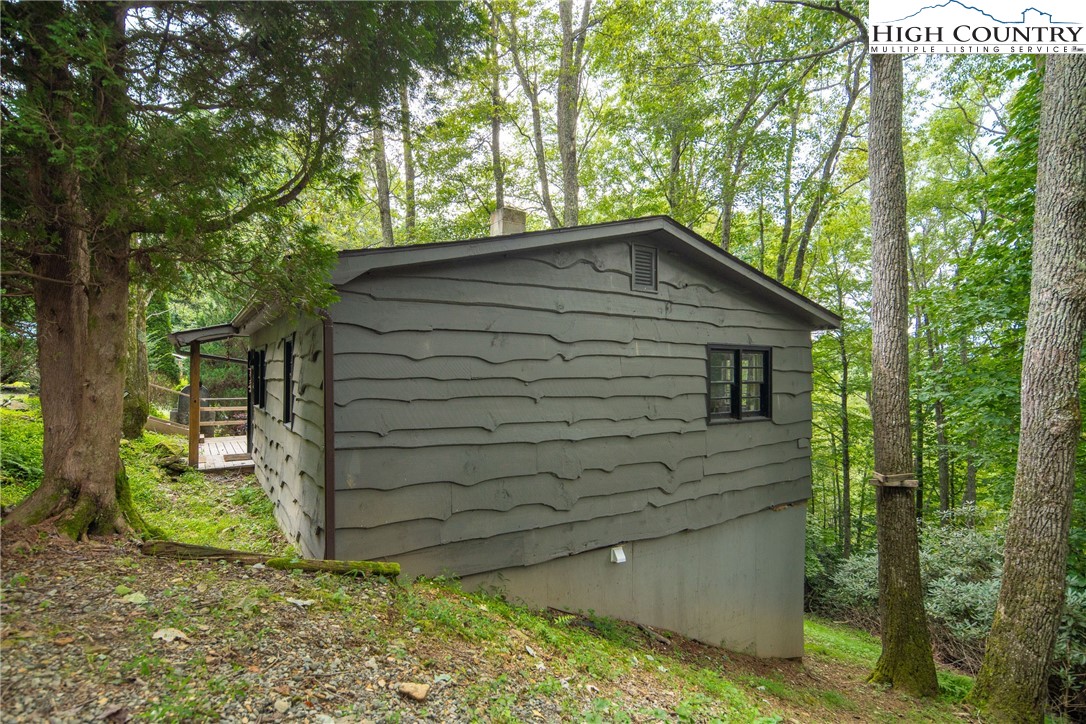 190 Bradley Court Boone, NC 28607 - Photo 23 of 28 a backyard of a house with lots of green space