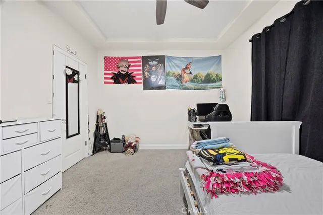 a bedroom with furniture and a bed