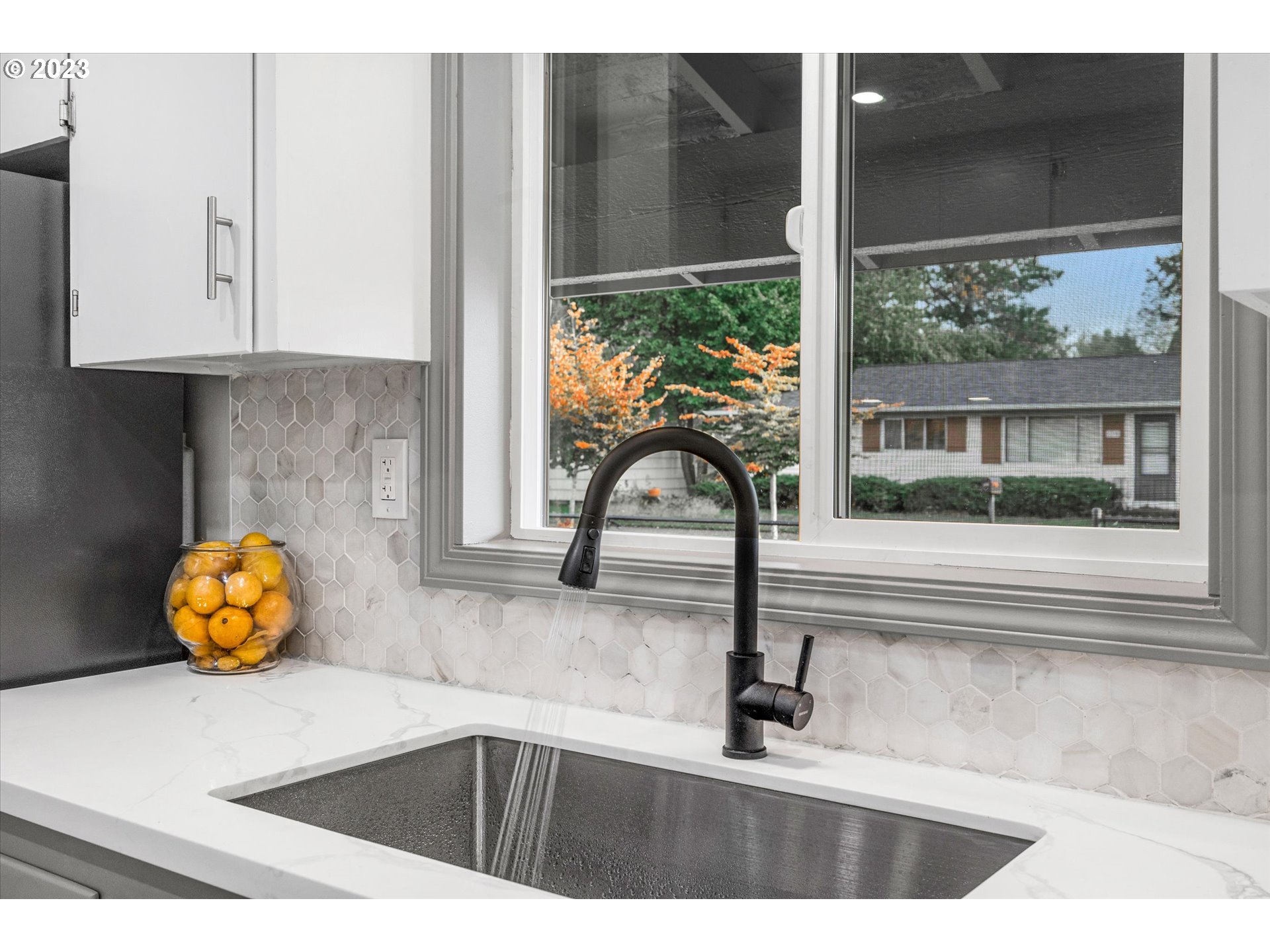 16331 Southeast Salmon Street Portland, OR 97233 - Photo 13 of 40 a kitchen with a sink and a window