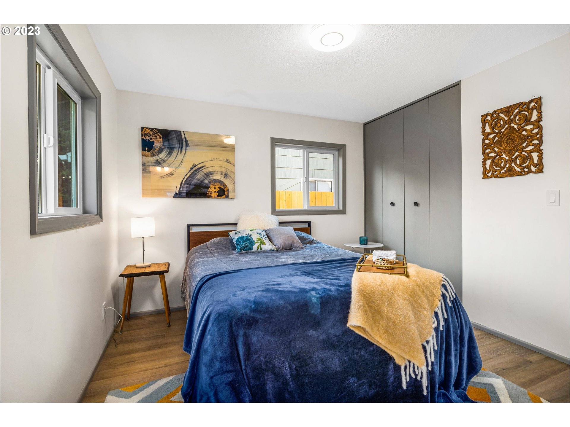 16331 Southeast Salmon Street Portland, OR 97233 - Photo 27 of 40 a bed room with a bed and a chair