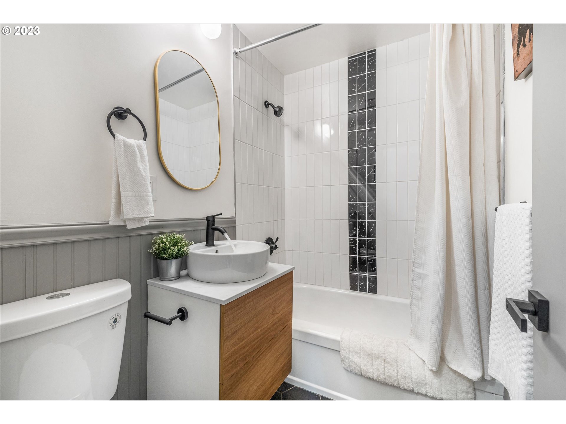 16331 Southeast Salmon Street Portland, OR 97233 - Photo 32 of 40 a bathroom with a sink and a mirror