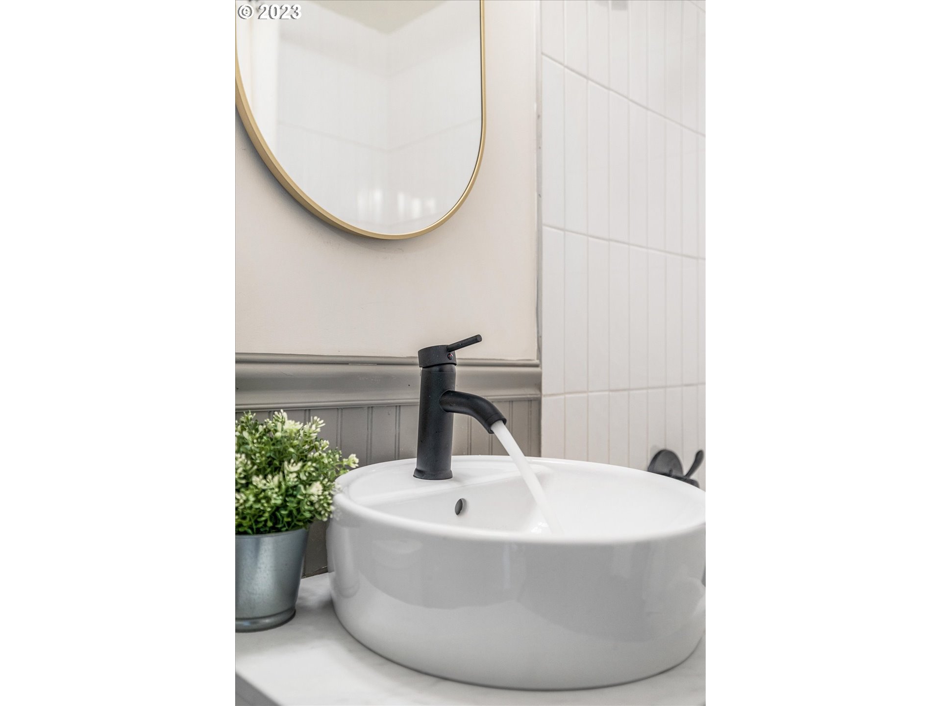 16331 Southeast Salmon Street Portland, OR 97233 - Photo 33 of 40 a bathroom with a sink and mirror