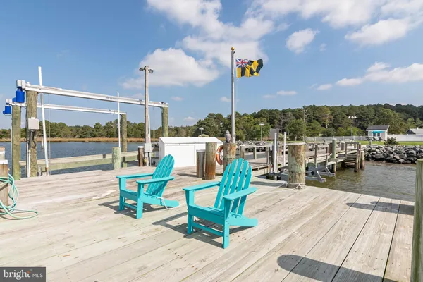 a view of an outdoor sitting area with furniture