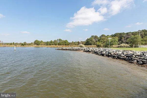 a view of a lake with a big yard