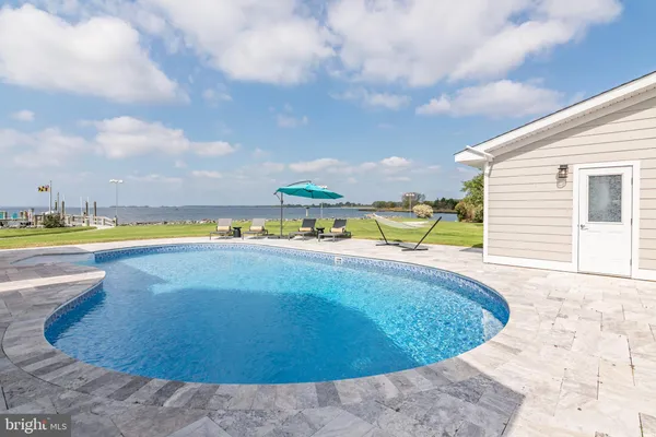 a view of outdoor space yard and swimming pool