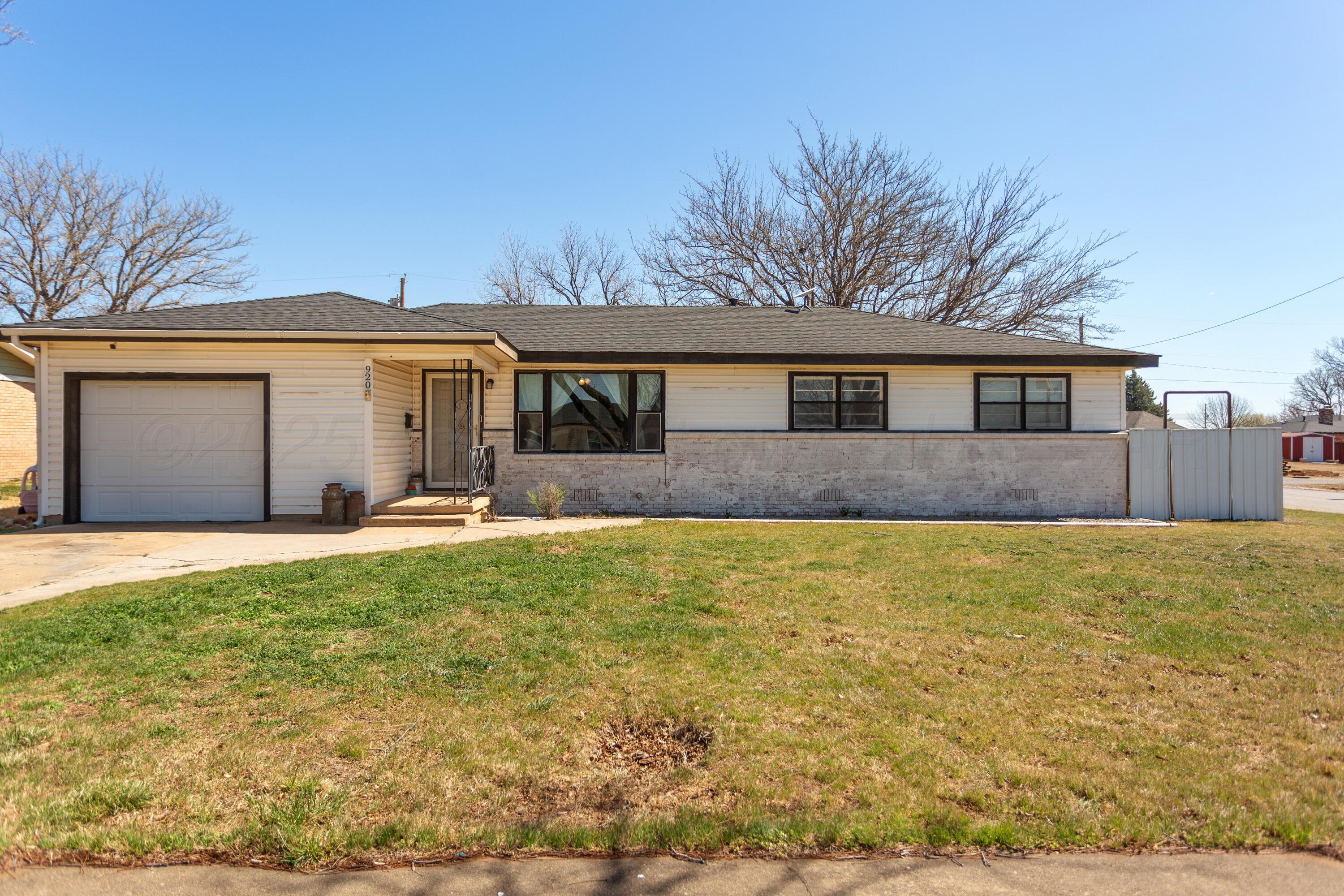 920 South Madden Street Shamrock, TX 79079 - Photo 1 of 39 a front view of house with yard and trees in the background